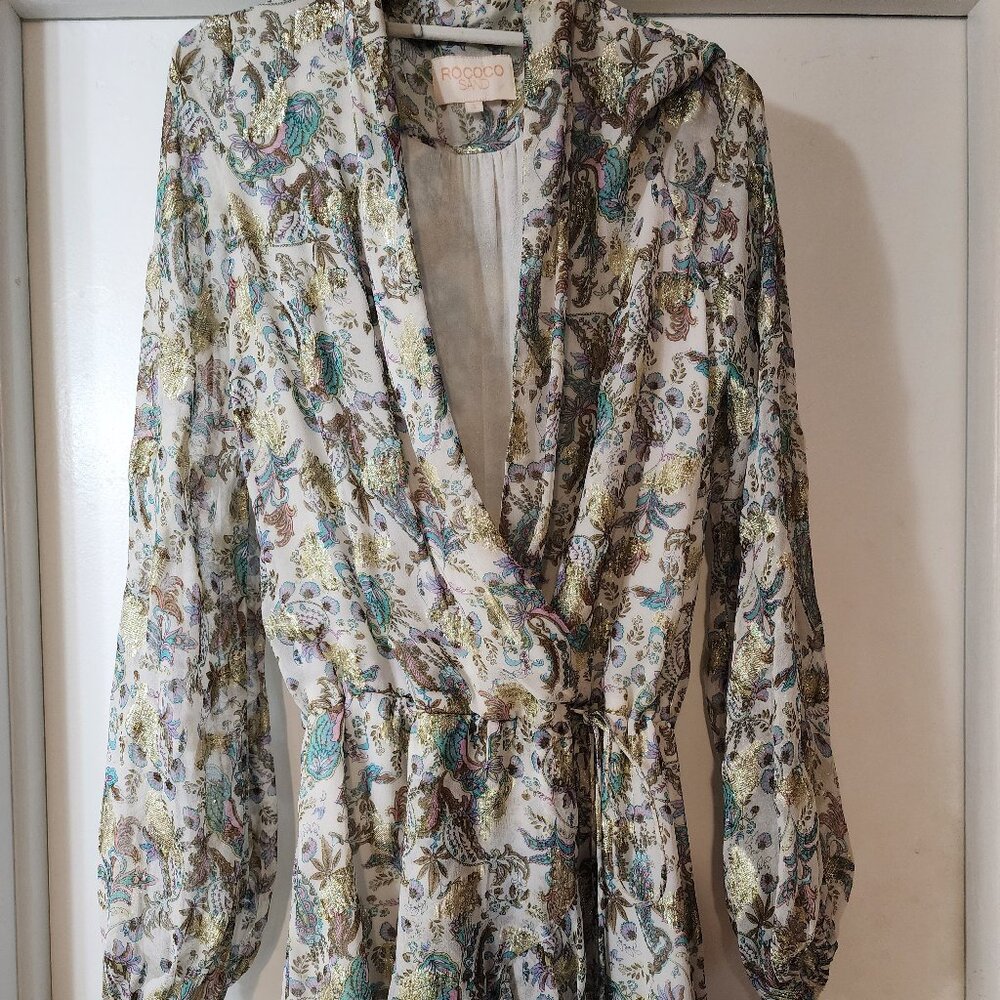 Rococo Sand Floral Metallic shear fabric mini wrap dress.